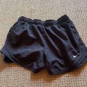 Black Nike running shorts